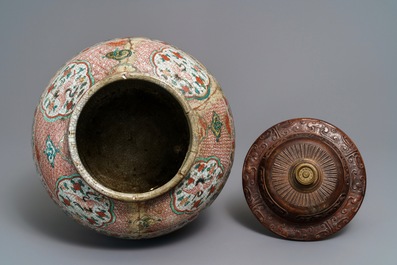 A Chinese polychrome Swatow jar with Buddhist lions among peony scrolls, Ming