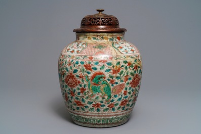A Chinese polychrome Swatow jar with Buddhist lions among peony scrolls, Ming