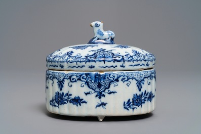 A Dutch Delft blue and white sheep-finial butter tub, 18th C.
