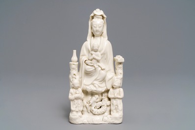 A Chinese Dehua blanc de Chine 'Guanyin with children 'group, Kangxi