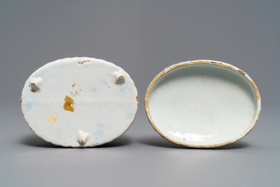 A Dutch Delft blue and white sheep-finial butter tub, 18th C.