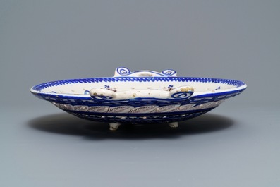 A large blue and manganese Frisian Delft fish strainer, Tichelaar, Makkum, 19th C.