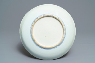 A Chinese blue and white dish with birds among blossoms, Transitional period