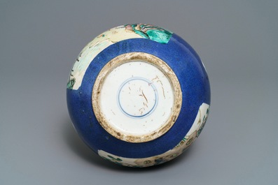 A Chinese famille verte powder blue-ground bottle vase, 19th C.