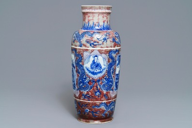 A rare Chinese blue, white and underglaze red rouleau vase, Kangxi