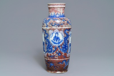 A rare Chinese blue, white and underglaze red rouleau vase, Kangxi