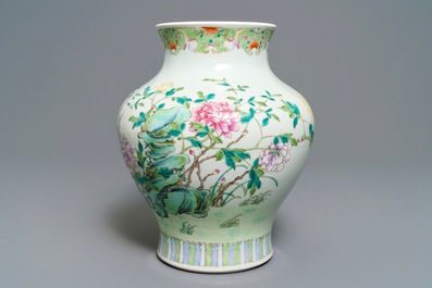 A Chinese famille rose vase with a bird on a flowering branch, 19th C.