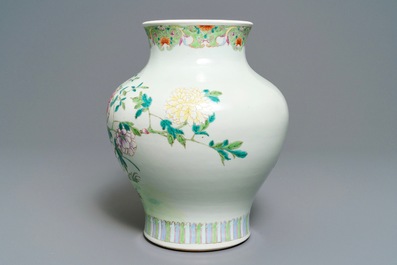 A Chinese famille rose vase with a bird on a flowering branch, 19th C.