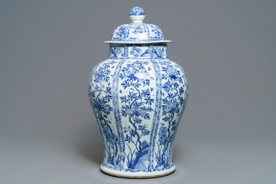A large Chinese blue and white baluster jar and cover with floral panels, Kangxi