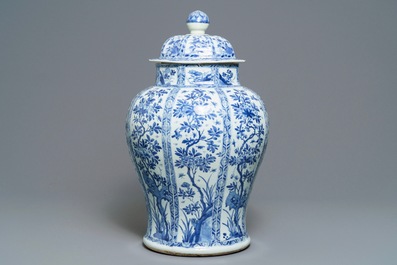 A large Chinese blue and white baluster jar and cover with floral panels, Kangxi
