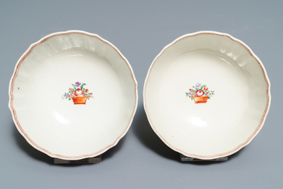 Two Chinese famille rose teapots and covers and two sets of cups and saucers, Qianlong