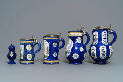 Four pewter-mounted Brussels faience jugs and a shaker, 18/19th C.