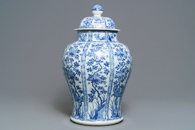 A large Chinese blue and white baluster jar and cover with floral panels, Kangxi
