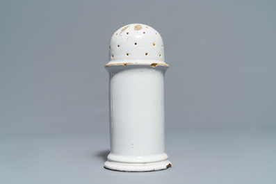 Four white Dutch Delft jugs, a pair of lobed plates and a large shaker, 17/18th C.