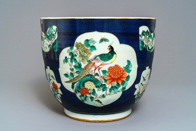 A Chinese blue-ground famille verte fishbowl, 19th C.