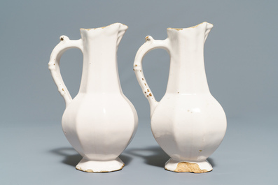 Four white Dutch Delft jugs, a pair of lobed plates and a large shaker, 17/18th C.