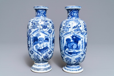 A pair of Chinese blue and white 'mythical beasts' vases, Kangxi