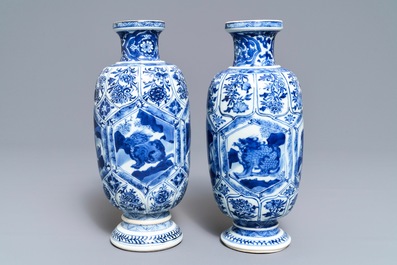 A pair of Chinese blue and white 'mythical beasts' vases, Kangxi