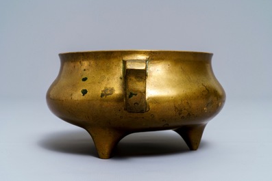 A Chinese bronze tripod censer, Qianlong mark, 19th C.