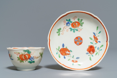 Two Chinese famille rose 'mandarin' bowls and three cups and saucers, Qianlong