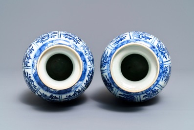 A pair of Chinese blue and white 'mythical beasts' vases, Kangxi