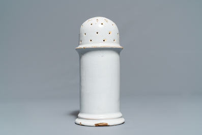 Four white Dutch Delft jugs, a pair of lobed plates and a large shaker, 17/18th C.
