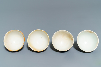 A Chinese shipwreck blue and white Islamic market 'aftaba' ewer and twelve cups, Transitional period