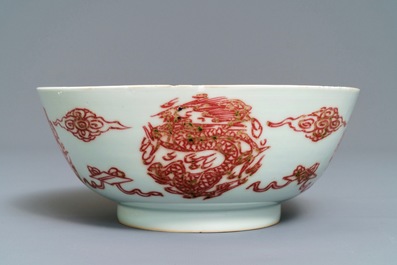 A Chinese underglaze red 'dragons and fish' bowl, 19/20th C.