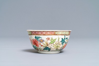 A fine Chinese famille rose cup and saucer with floral design, Yongzheng