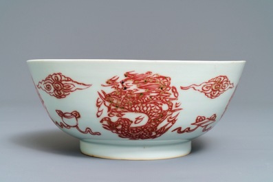 A Chinese underglaze red 'dragons and fish' bowl, 19/20th C.