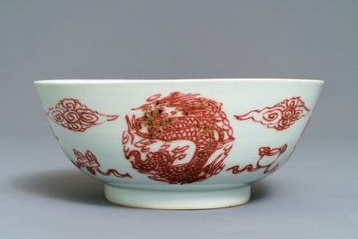 A Chinese underglaze red 'dragons and fish' bowl, 19/20th C.