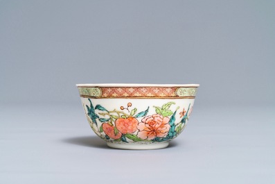 A fine Chinese famille rose cup and saucer with floral design, Yongzheng