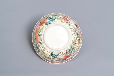 A fine Chinese famille rose cup and saucer with floral design, Yongzheng