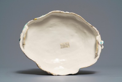 A large and impressive Brussels faience tureen with a lion fighting a dog, 1st half 18th C.