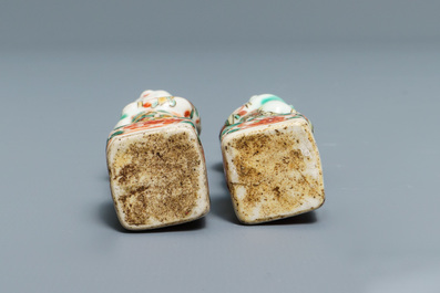 Four Chinese 'Tek Sing Cargo' biscuit boys and a pair of famille verte Hoho boys, Kangxi