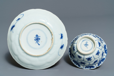 Twelve Chinese blue and white cups and saucers with floral design, Kangxi/Qianlong