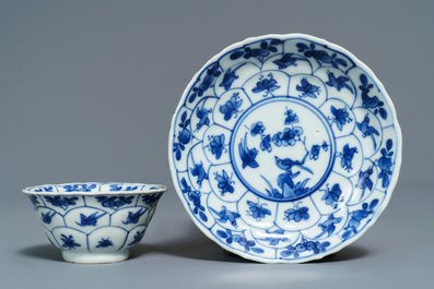 Twelve Chinese blue and white cups and saucers with floral design, Kangxi/Qianlong