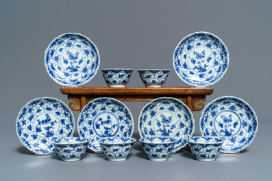 Twelve Chinese blue and white cups and saucers with floral design, Kangxi/Qianlong
