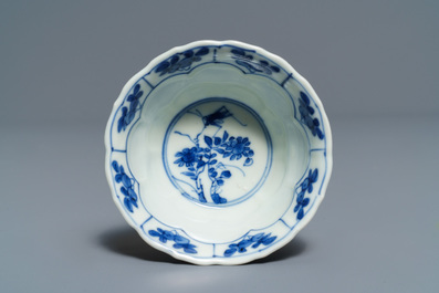 Twelve Chinese blue and white cups and saucers with floral design, Kangxi/Qianlong