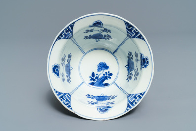 Six Chinese blue and white bowls on stands, Kangxi