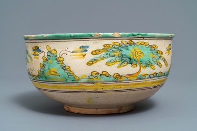A large polychrome Spanish bowl with a bull, Talavera, 18th C.