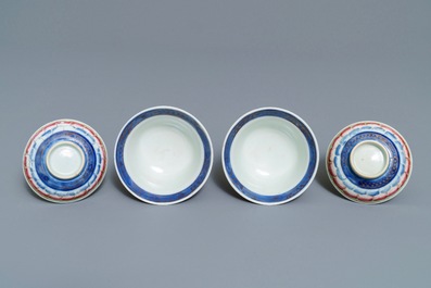 A pair of Chinese famille rose 'lotus' bowls and covers on stands, Qianlong