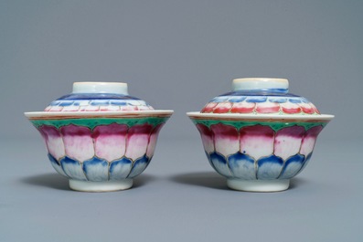 A pair of Chinese famille rose 'lotus' bowls and covers on stands, Qianlong