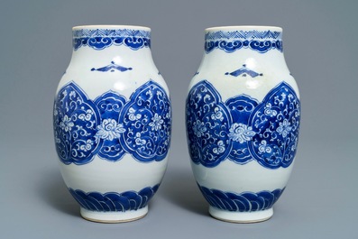 A pair of Chinese blue and white vases and two bowls, Kangxi