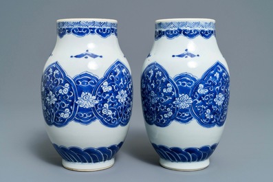 A pair of Chinese blue and white vases and two bowls, Kangxi