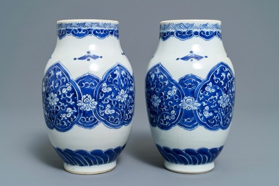 A pair of Chinese blue and white vases and two bowls, Kangxi