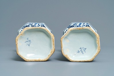 A Dutch Delft blue and white five-piece garniture with pastoral design, 18th C.