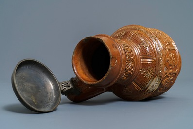 Een steengoed 'keurvorsten' kruik met tinnen deksel, Raeren, gedat. 1603