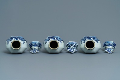 A Dutch Delft blue and white five-piece garniture with pastoral design, 18th C.
