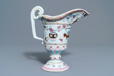 A Chinese famille rose helmet-shaped jug and a relief-decorated teapot, Yongzheng